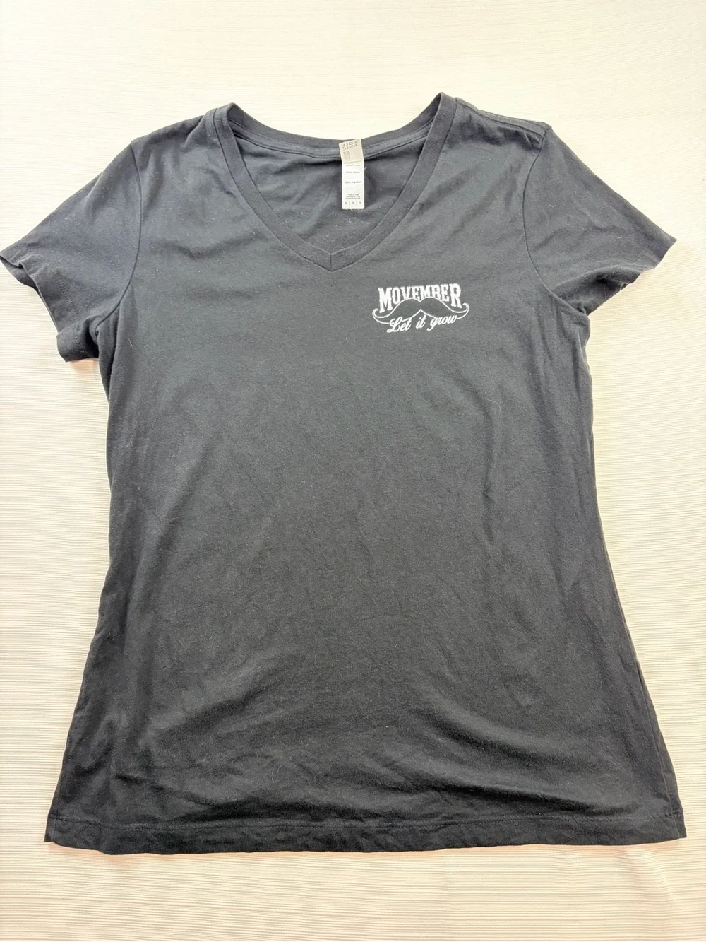District Black Tee with White 'No Shave Movember' Graphic